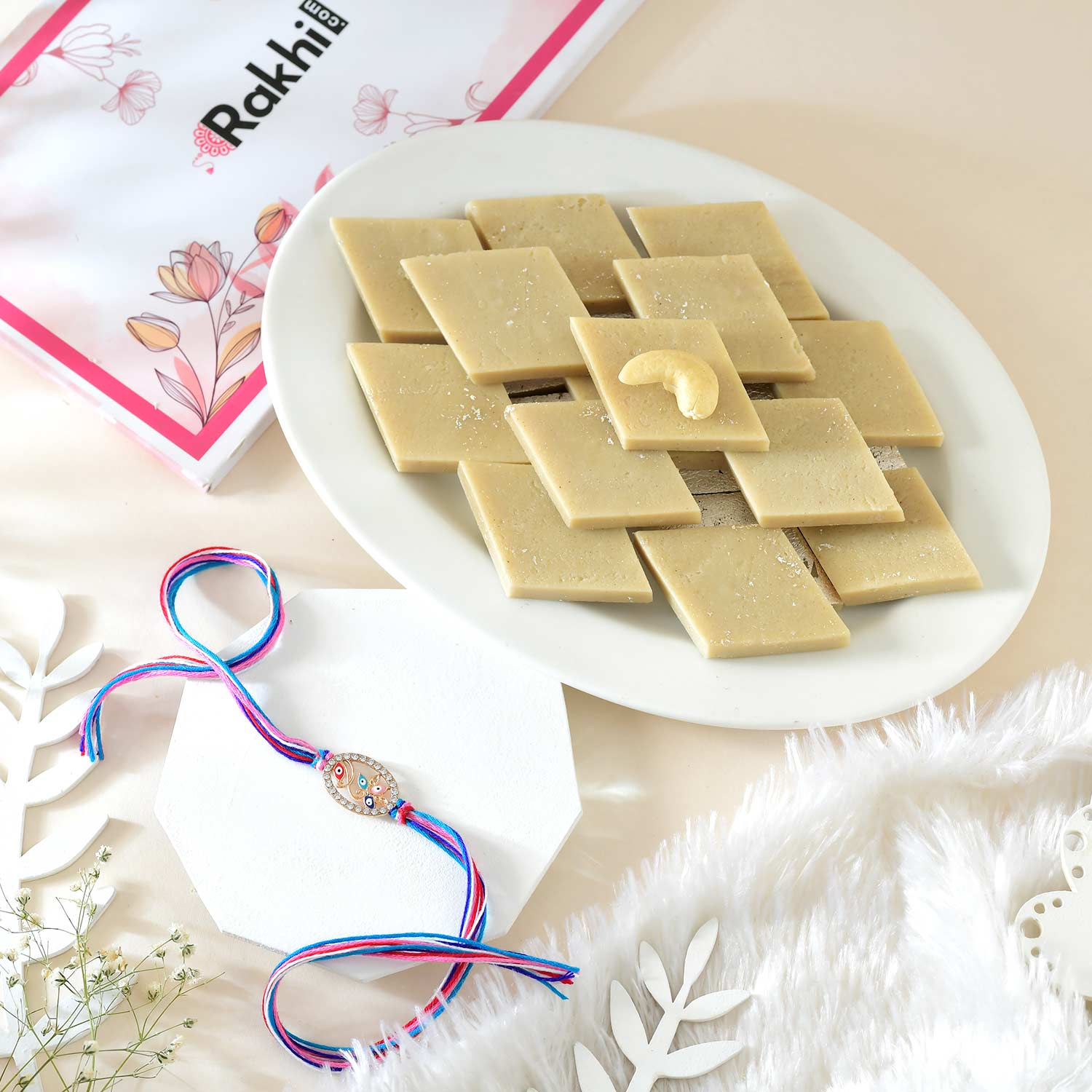 Designer Evil Eye Flower Rakhi With Kaju Katli